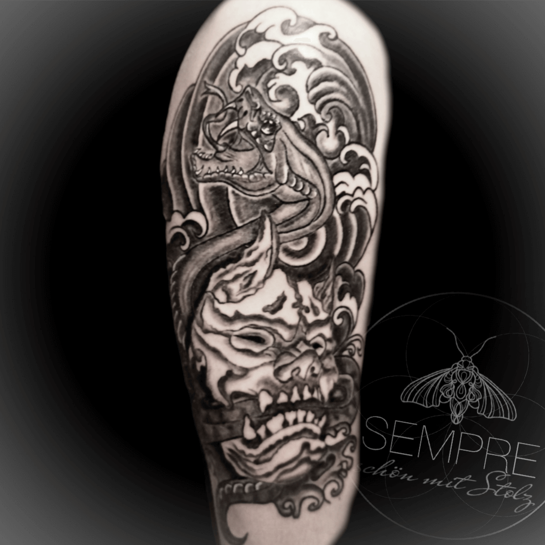 Tattoo am Oberarm: Drachenmotiv mit vielen Details, gestochen in Bad Mergentheim